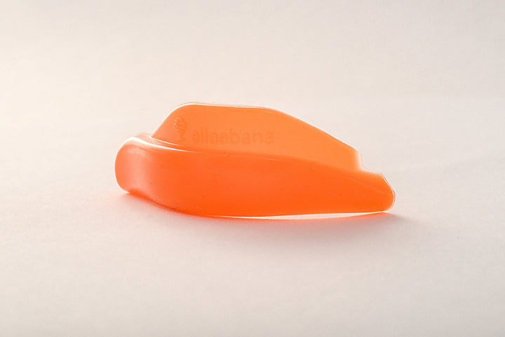 Elleebana Hybrid Flex Shields with tree tab grip for easy placement and removal.